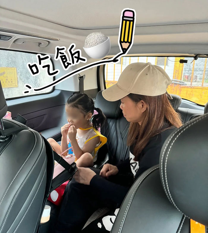 Mother and young child sitting inside a car with the child eating, related to monster mom preschool story. Mother and young child sitting inside a car with the child eating, related to monster mom preschool story.