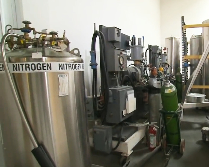 Cryonics facility with nitrogen tanks and equipment used to freeze and preserve bodies after death for long-term storage. Cryonics facility with nitrogen tanks and equipment used to freeze and preserve bodies after death for long-term storage.