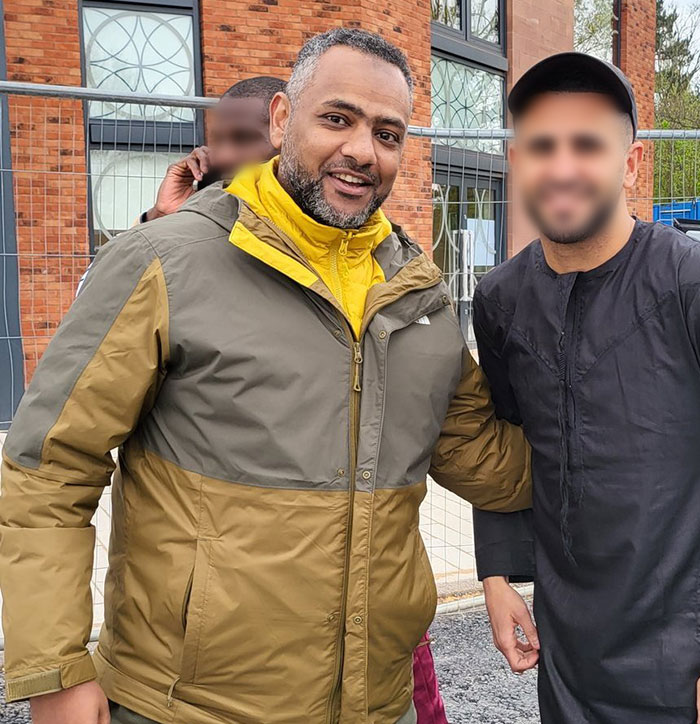 Father of four with 37 followers faces 10 years in jail over deleted tweet, pictured outdoors with friends.