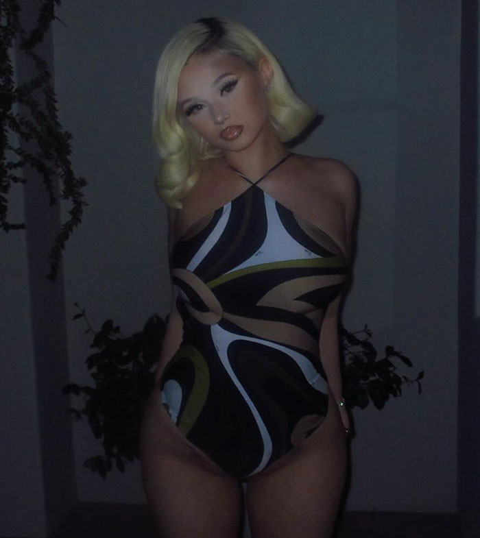 Alabama Barker posing in a patterned bikini during a photoshoot, attracting attention after weight-loss medication use. Alabama Barker posing in a patterned bikini during a photoshoot, attracting attention after weight-loss medication use.