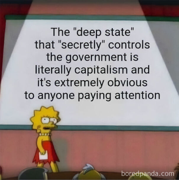 Lisa Simpson presenting a slide claiming capitalism secretly controls the government, reflecting anti-capitalism views.