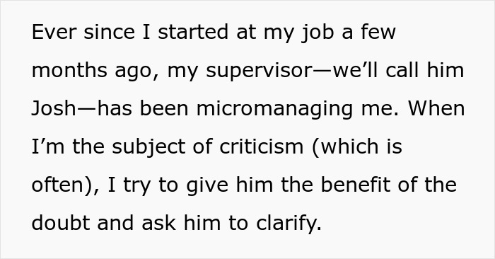 Employee in full suit at office successfully challenges berating boss, leading to boss demotion after workplace conflict.
