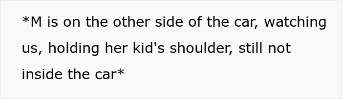 Text on a gray background reading M is on the other side of the car holding her kid's shoulder, not inside the car.