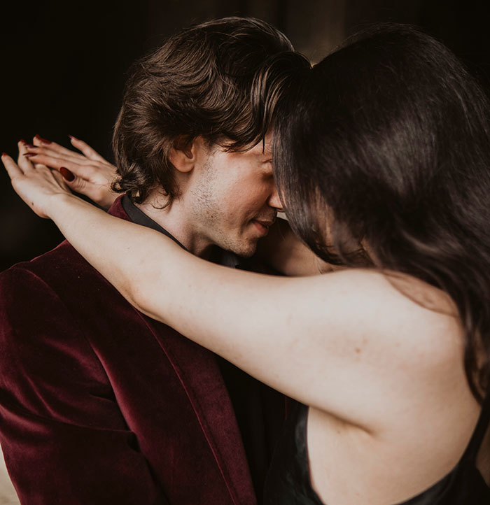 Couple embracing closely in an intimate moment, highlighting the biggest elephant or blue whale in the room concept.