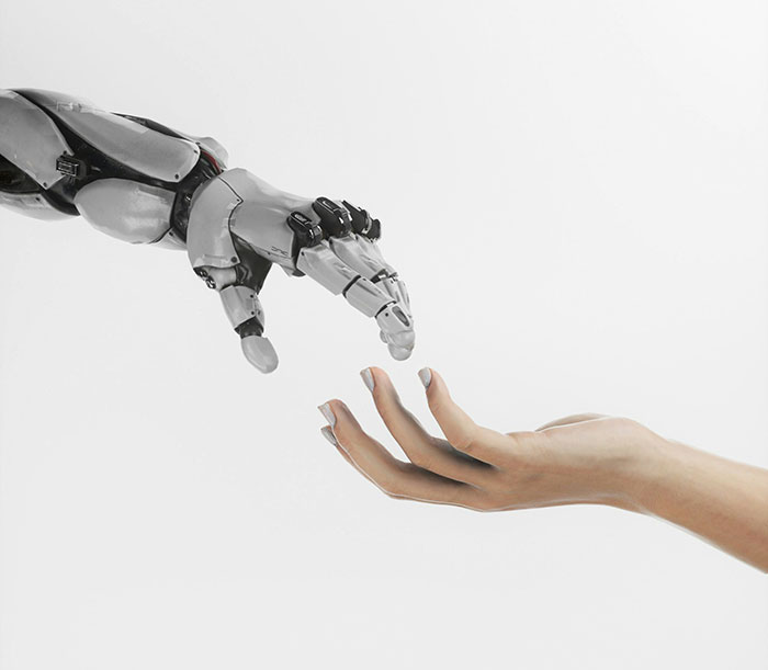 Robot hand and human hand reaching towards each other symbolizing connection and the biggest elephant in the room concept.