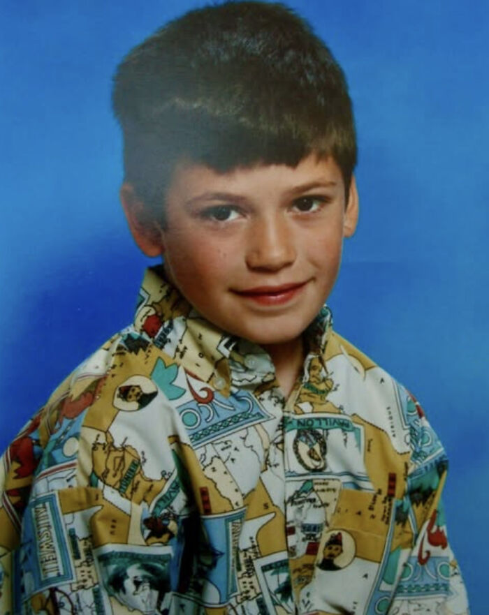 Young boy in a colorful map-print shirt, related to Harry Potter star who played Viktor Krum in emergency surgery news.