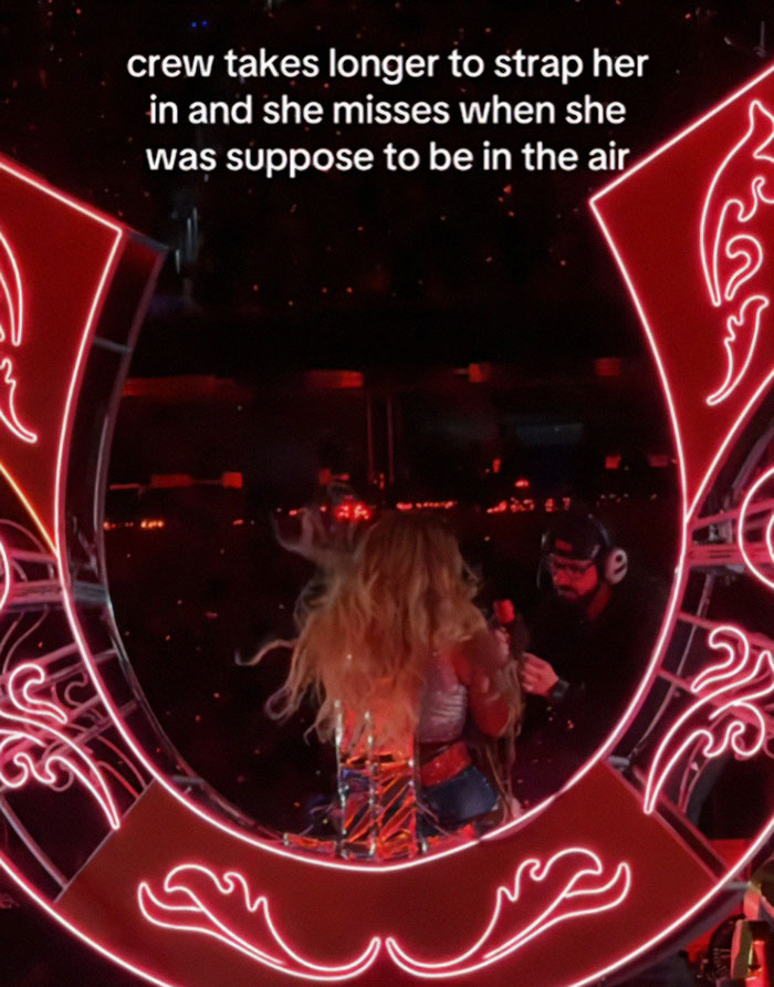 Beyoncé on stage amid a dangerous malfunction during her show, with crew assisting her to prevent injury. Beyoncé on stage amid a dangerous malfunction during her show, with crew assisting her to prevent injury.