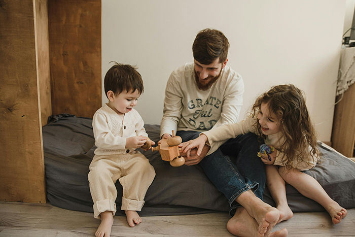 Man refuses to babysit sister’s kids while children play together, showing family dynamics and burnout feelings. Man refuses to babysit sister’s kids while children play together, showing family dynamics and burnout feelings.