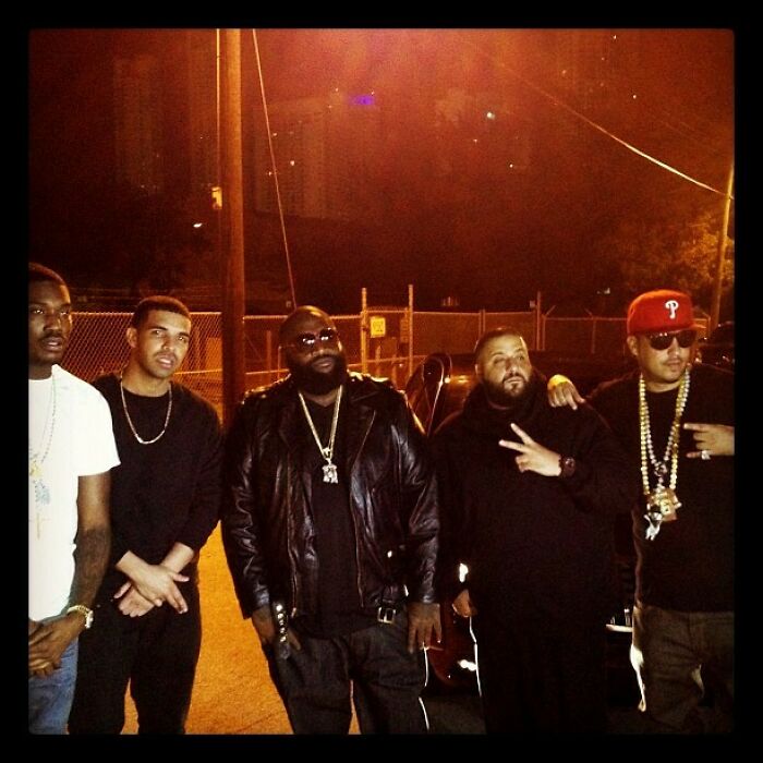 Group of celebrities posing together outdoors at night, showcasing iconic Instagram posts shared way back in the day.