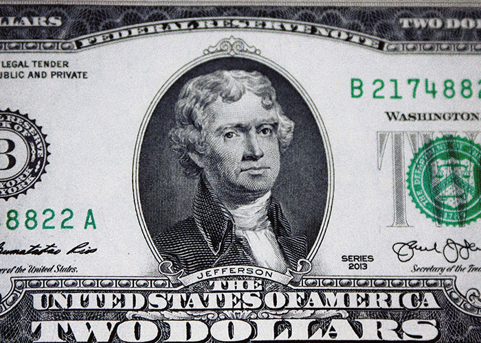 Close-up of a two-dollar bill featuring Thomas Jefferson, illustrating surprising facts people can't believe they had to explain.