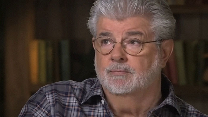 Older man with gray hair and glasses wearing a plaid shirt, reflecting on celebrities famous before their fame struck.