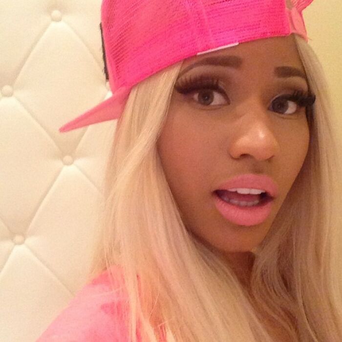 Close-up of a celebrity with long blonde hair and pink cap, one of the Instagram posts celebrities shared way back in the day.