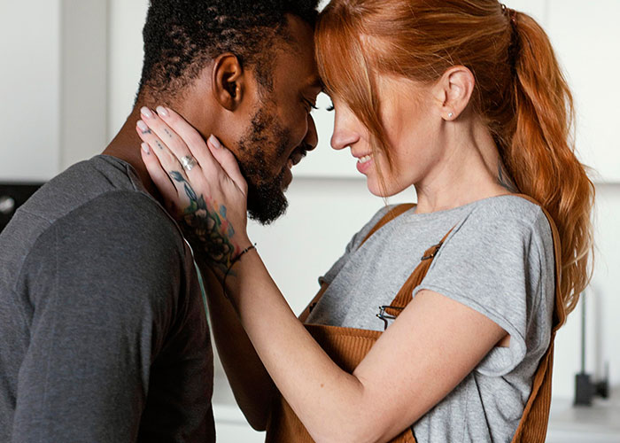 Couple sharing an intimate moment, illustrating themes of relationships and confessions from people who cheated.