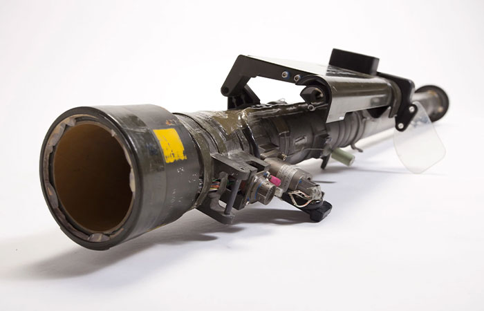 Close-up of vintage CIA spy technology device with complex mechanical parts, illustrating innovative espionage tools and human ingenuity.