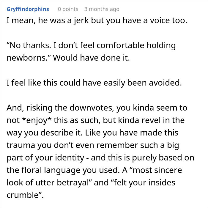 Screenshot of a Reddit comment discussing a woman&rsquo;s trauma and discomfort holding a newborn baby.