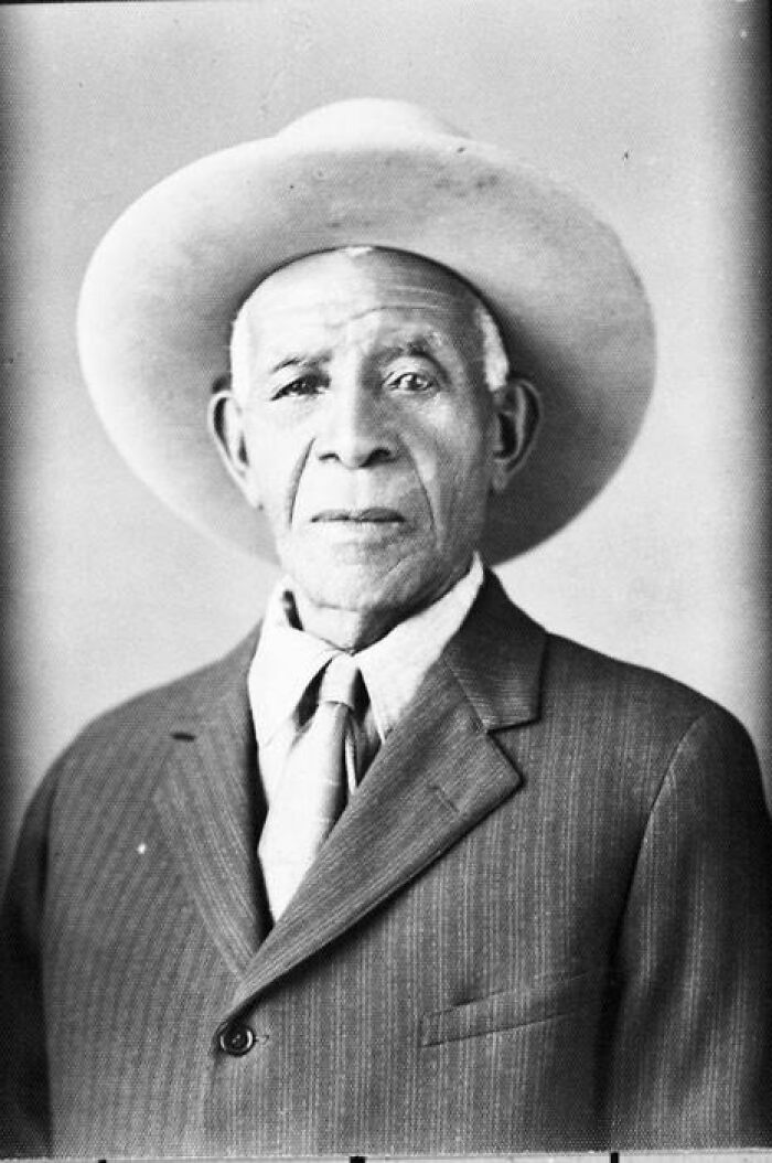 Portrait of an elderly man wearing a wide-brimmed hat and suit, illustrating unusual fascinating historical facts.