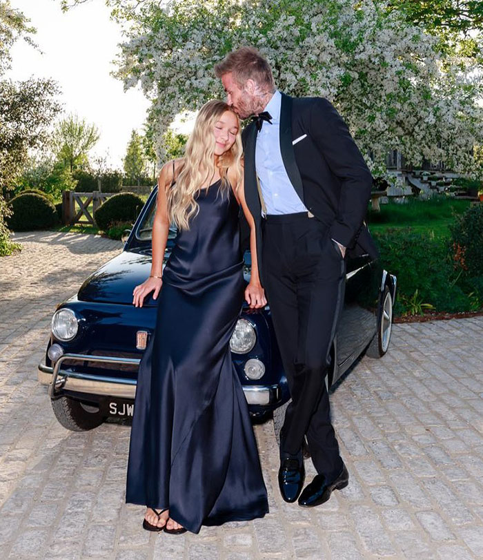 David Beckham in tuxedo with daughter in satin dress at 50th birthday party amid major family feud and social media photos.