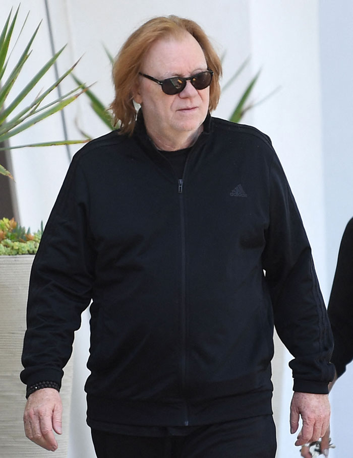 David Caruso, coolest TV cop, wearing sunglasses and black jacket, making a rare public appearance after 13-year hiatus.