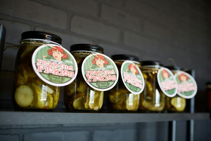 Jars of Pickle Girl Pickles on a shelf, illustrating body changes that indicate you are clearly getting older.