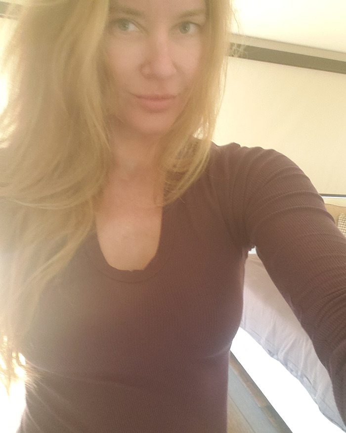 Vivian Musk, Elon Musk's trans daughter, poses for a soft-lit selfie showcasing her modeling debut and unique style.