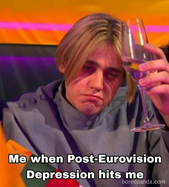 Young person holding a glass looking sad, illustrating post-Eurovision depression in 2025 Eurovision Song Contest memes.