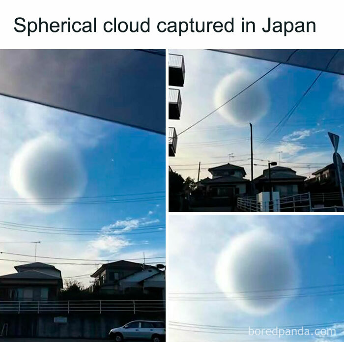 Spherical cloud in Japan floating above residential area with houses and power lines on a clear blue sky background.