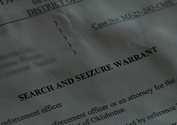 Search and seizure warrant document related to ICE agents raiding wrong home and family's life savings taken.