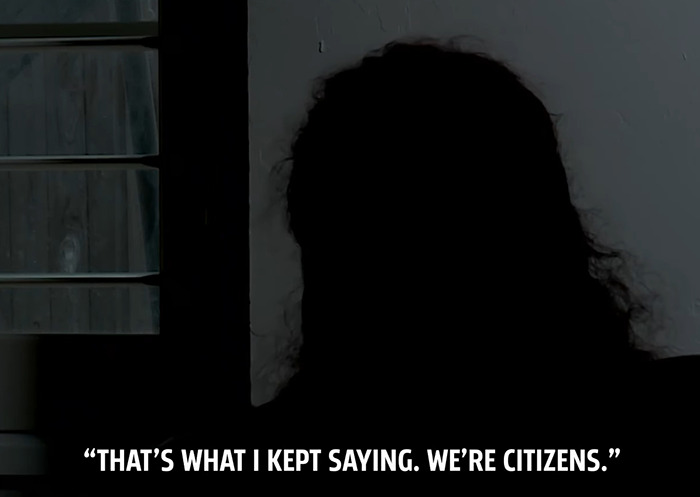 Silhouetted person inside a dark room with text discussing being citizens after ICE agents raid wrong home.