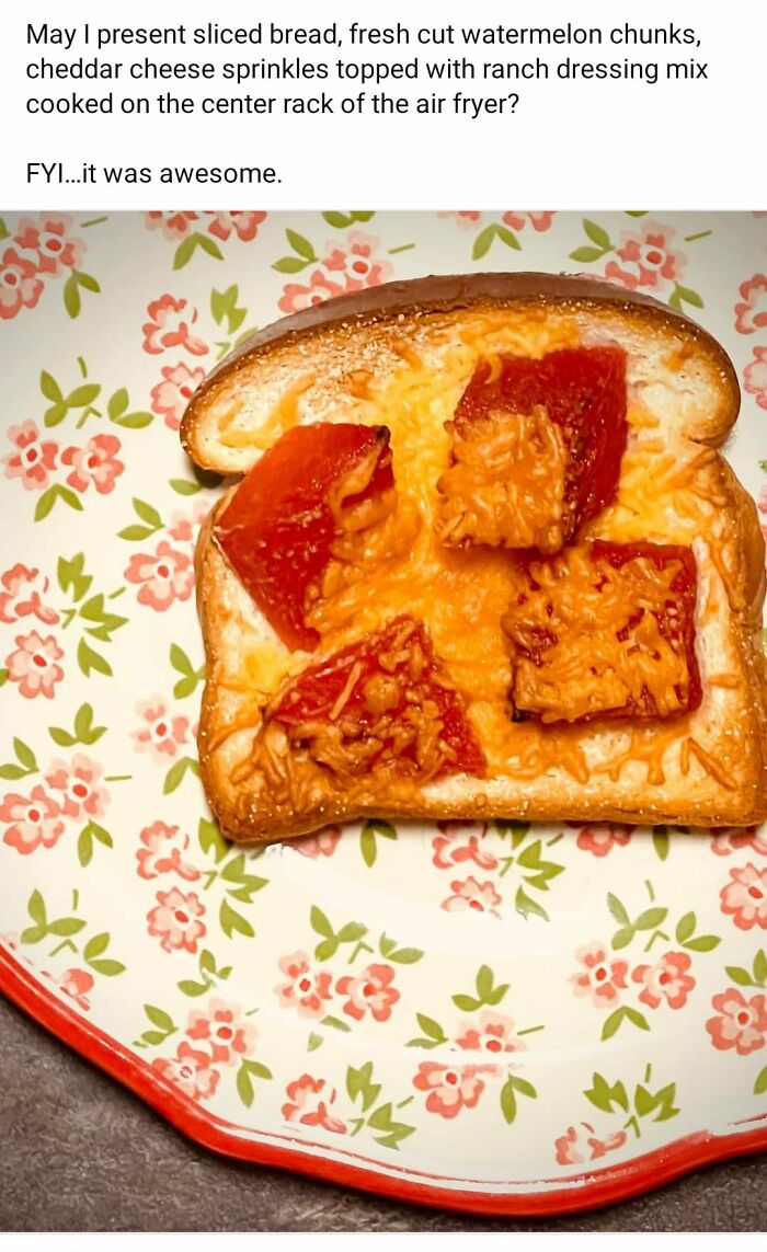 Air fried sliced bread topped with cheddar cheese, watermelon chunks, and ranch dressing on a floral plate, cursed food pic.