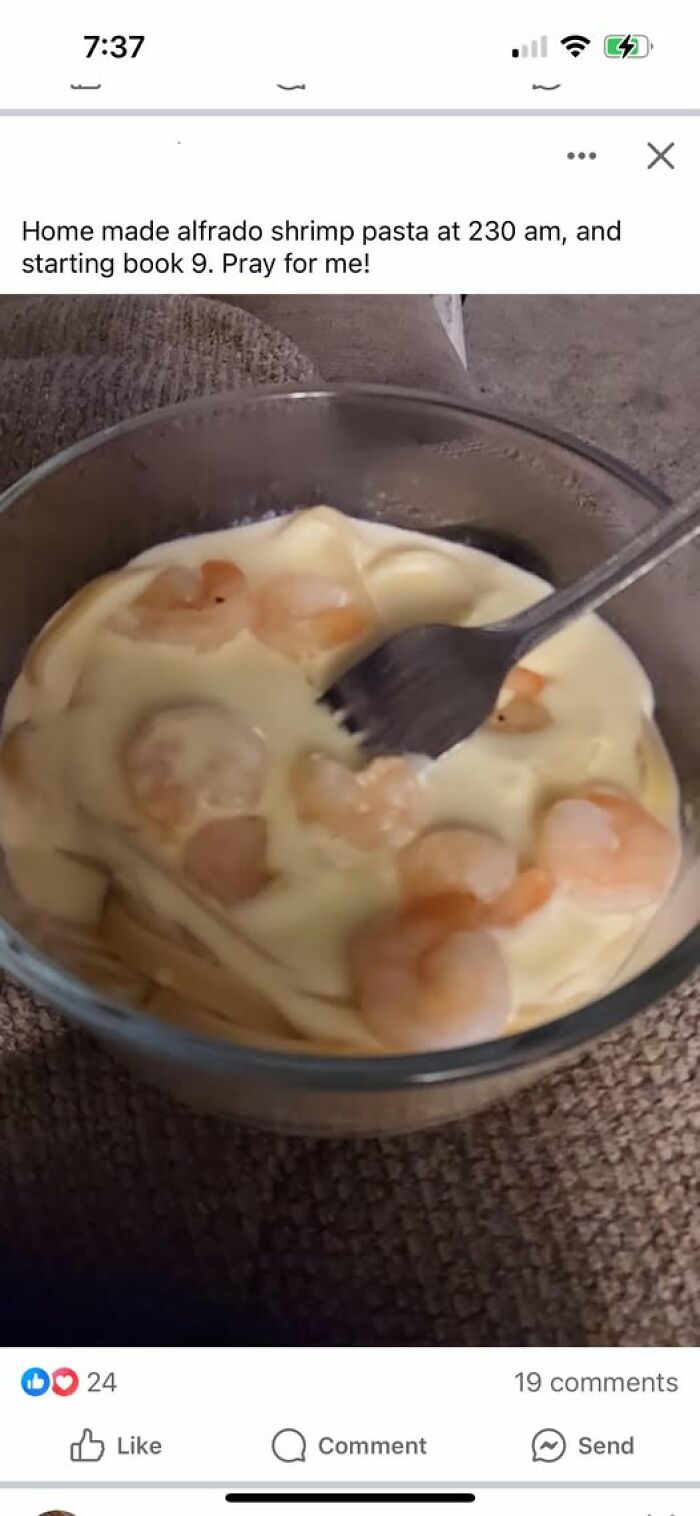Shrimp pasta with thick Alfredo sauce served in a glass bowl, illustrating a cursed food pic from late-night cooking.