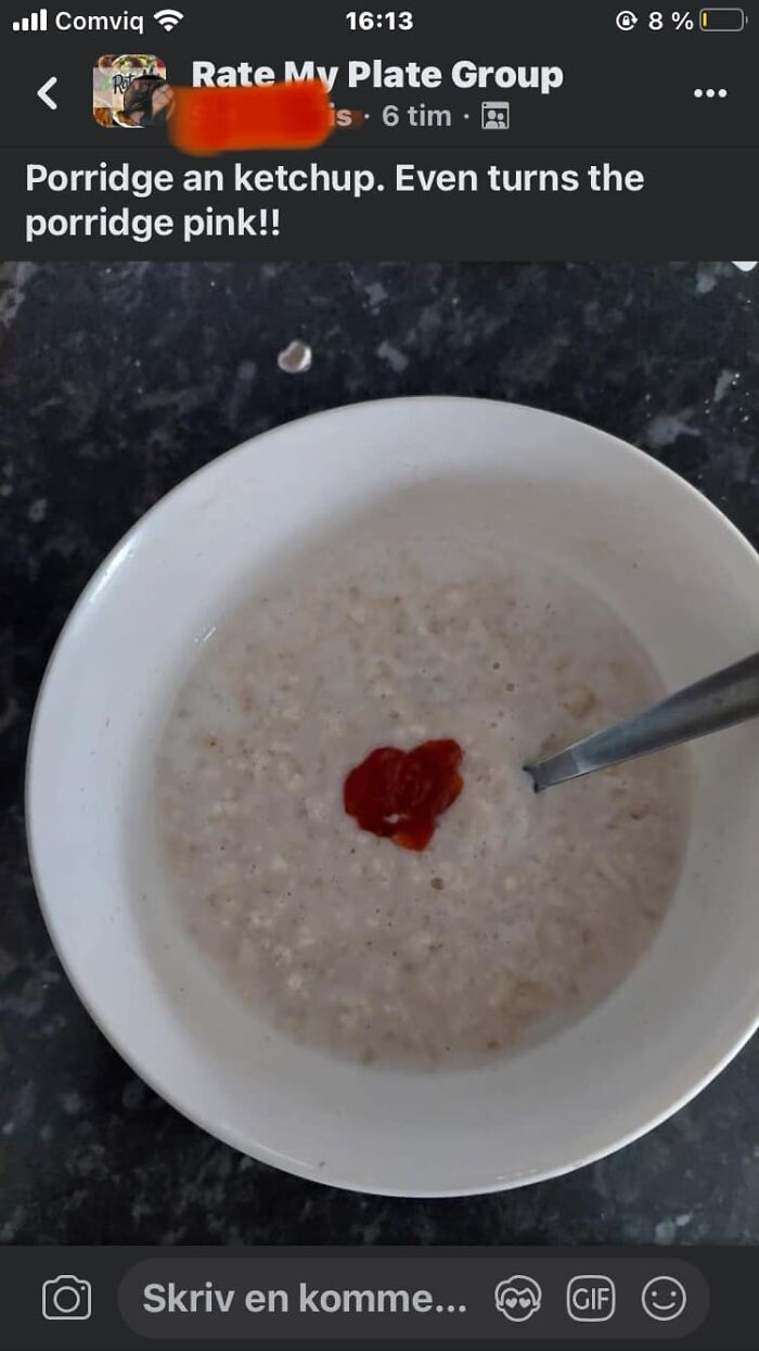 Bowl of porridge with a dollop of ketchup in the center, showcasing a cursed food combination from weird food pics.