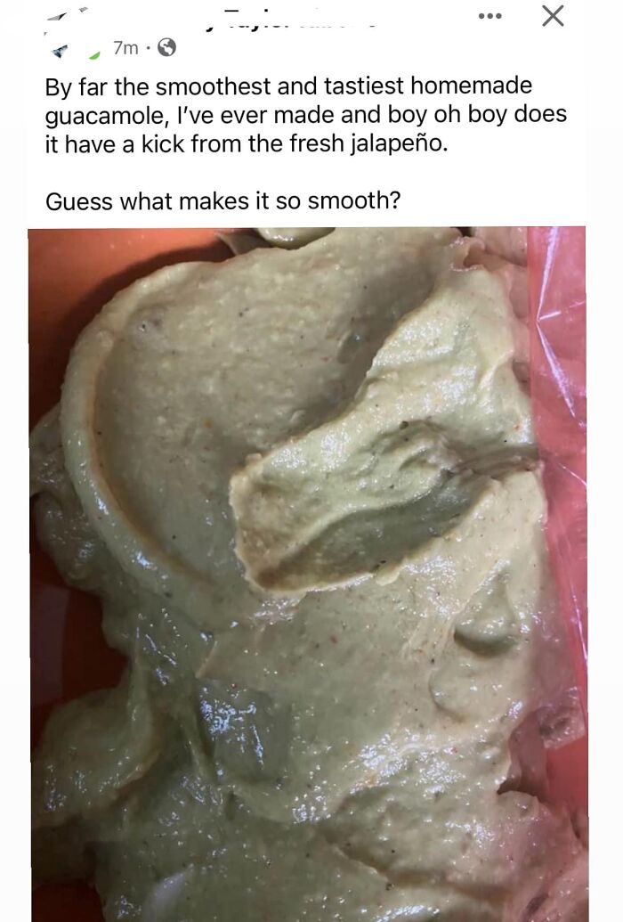 Close-up of a smooth but unappetizing homemade guacamole with a strange texture, a cursed food pic example.
