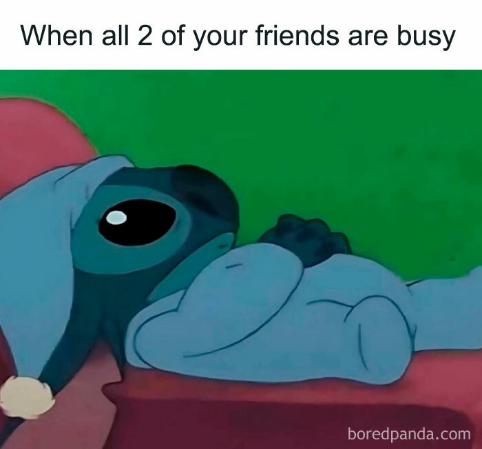 Sad Stitch lying in bed wearing a nightcap, reflecting the millennial mind feeling lonely when friends are busy.