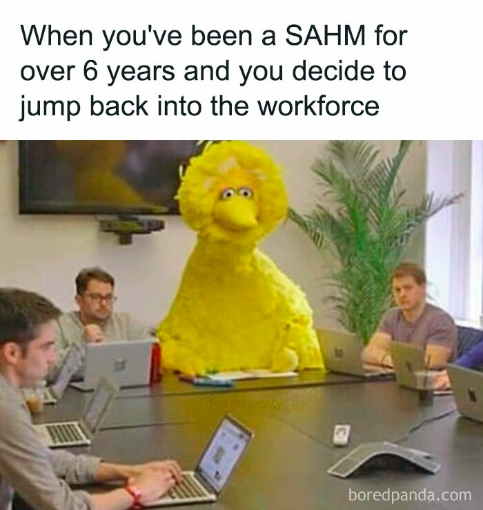 Big Bird sitting awkwardly in an office meeting while people work on laptops, illustrating funny parenting memes.