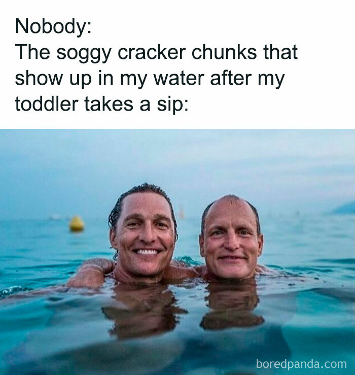 Two men smiling and hugging in the water, illustrating funny parenting memes that are painfully relatable to toddlers.
