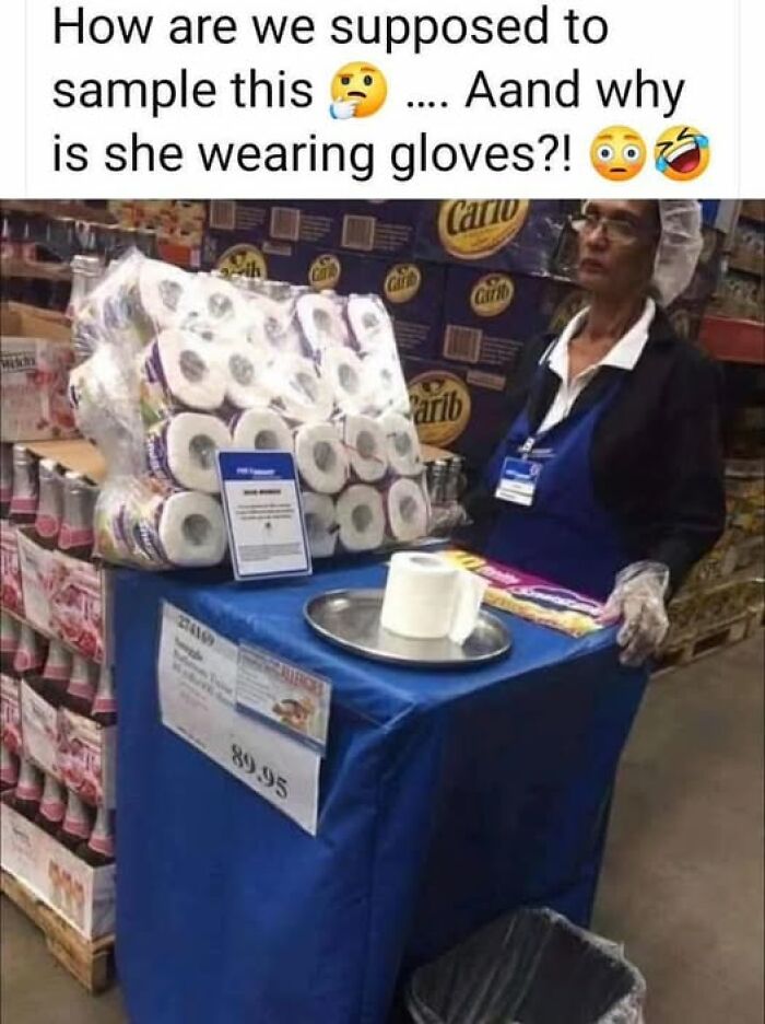 Woman wearing gloves at a sample table with toilet paper rolls in a store, humorously questioning the sampling method – vegan memes.