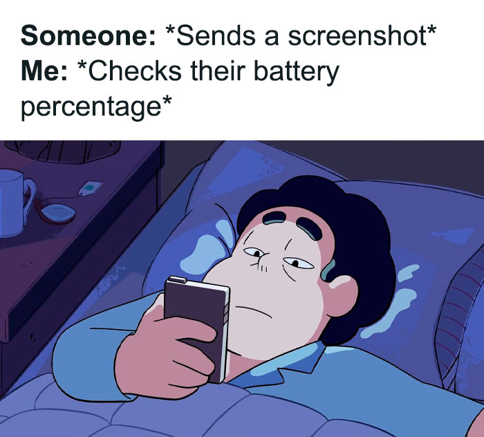 Person lying in bed checking phone battery percentage, relatable meme about human experience and daily habits.