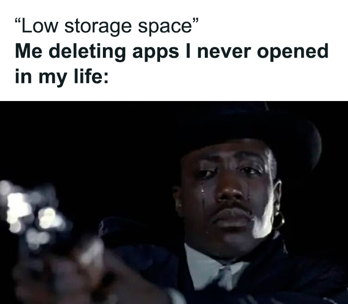 Man in a hat tearing up while deleting unused apps, illustrating common human experience in humorous meme form.