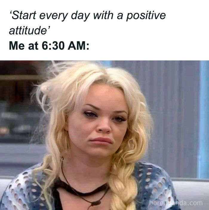 Tired woman with messy blonde hair, sarcastic relatable meme about starting the day with a positive attitude at 6:30 AM.