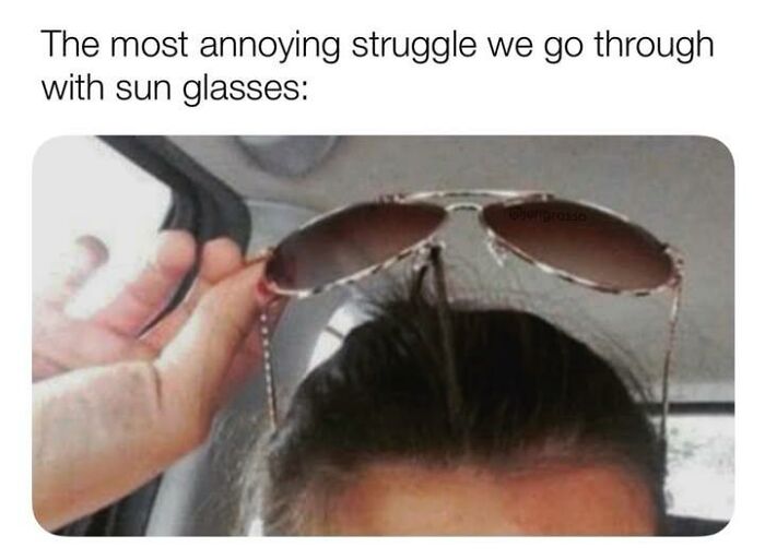 Person struggling to put sunglasses on their head with text about annoying struggles in random memes hilarious nonsense.