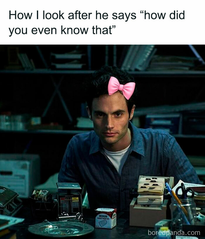 Man with a pink bow photoshopped on his head sitting at a desk, part of random memes delivering hilarious nonsense.