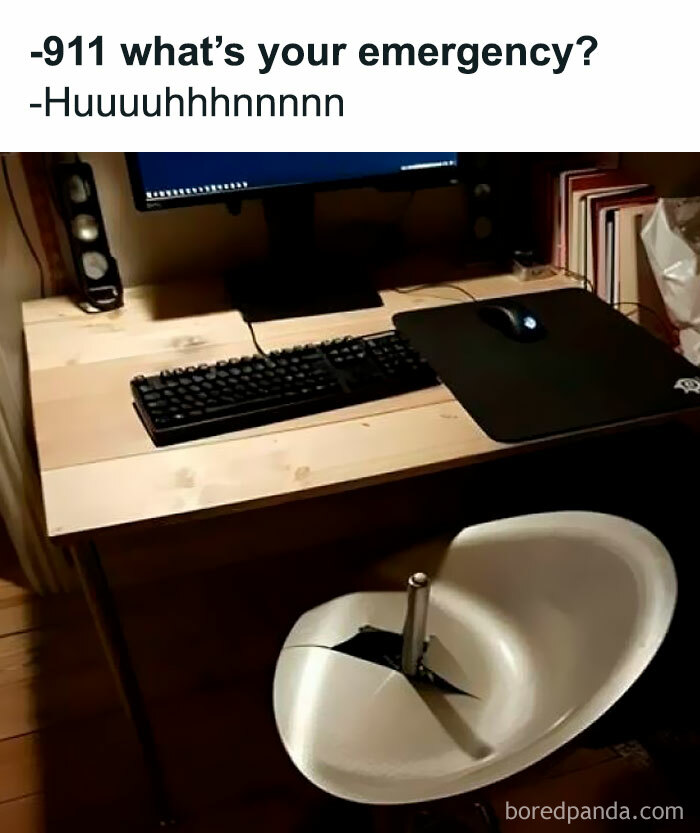Broken swivel chair in front of a computer desk with a keyboard, mouse, and monitor, showcasing hilarious random memes.