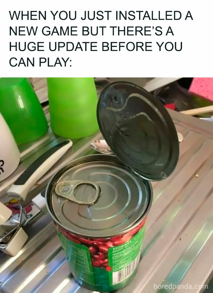 Opened can with lid still attached on kitchen counter, illustrating a funny random meme about game updates and hilarious nonsense.