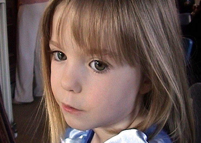 Close-up of young girl Madeleine McCann with blonde hair and green eyes, related to German police urgent request.