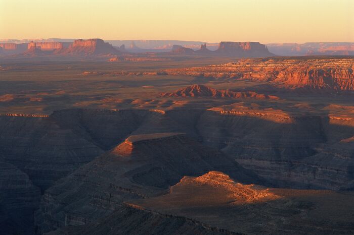 Vast desert canyon landscape at sunset highlighting natural wonders that prove the world is still full of magic