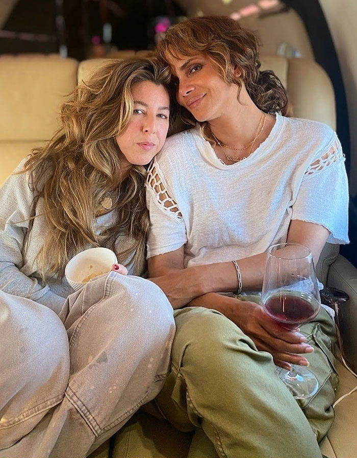 Halle Berry and her stylist seated together casually, capturing a relaxed moment after Met Gala fashion event. Halle Berry and her stylist seated together casually, capturing a relaxed moment after Met Gala fashion event.