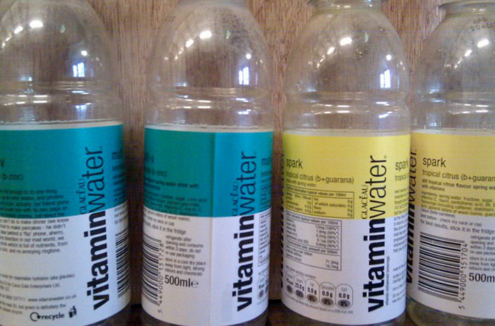 Bottles of vitaminwater lined up, illustrating examples of healthy foods you might want to skip eating.