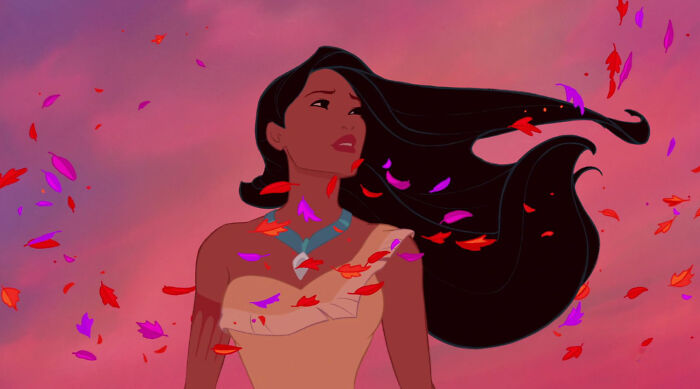 Animated woman with long flowing black hair surrounded by colorful autumn leaves representing unconventional crushes.