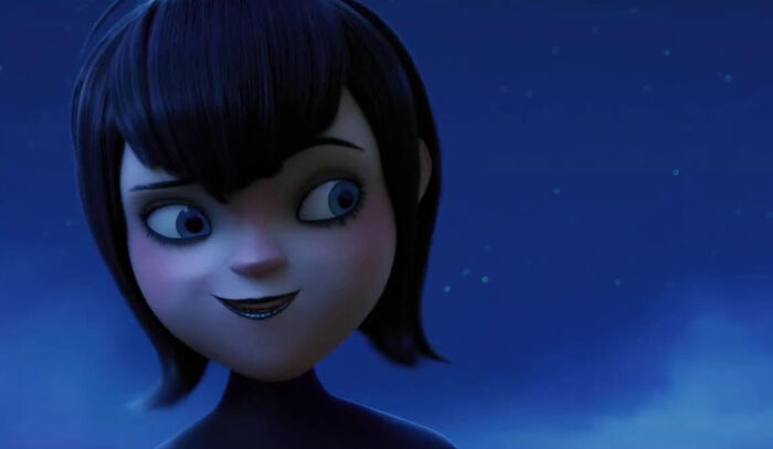 Animated character with short dark hair and blue eyes smiling slyly against a night sky showing unconventional crushes concept.
