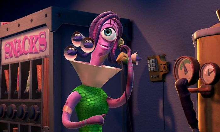 Animated character with unconventional crushes standing by a snack machine, holding a phone in a dimly lit room.
